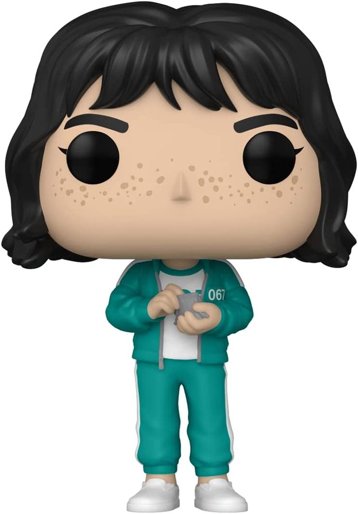 a pop vinyl figure with black hair and green pants