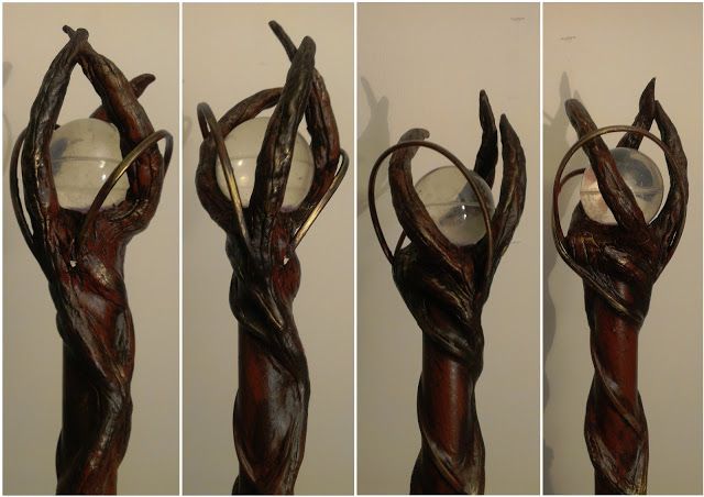 four different views of a sculpture made out of wood