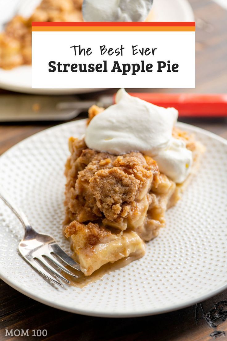 the best ever streusel apple pie on a white plate with a fork in front of it