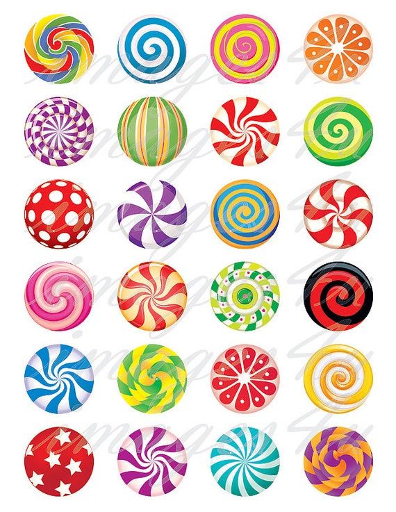 an assortment of colorful lollipops in various shapes and sizes on a white background