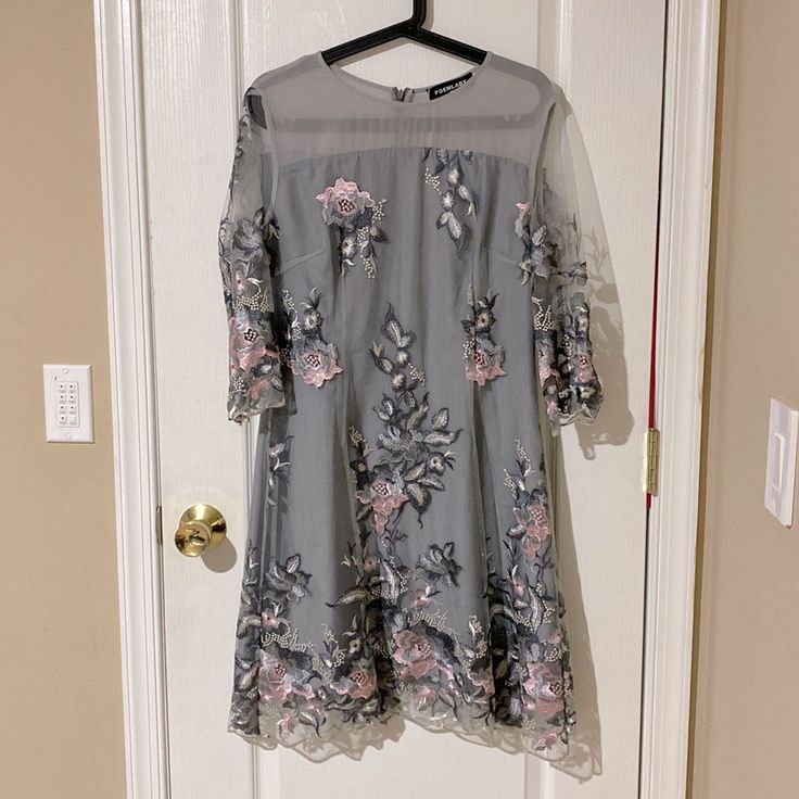 Cute Gray Dress With Floral Embroidery. Perfect For Wedding Or Evening Out. A-line Wedding Dress With Intricate Embroidery, Spring Floral Embroidered Formal Evening Dress, Spring Floral Embroidered Evening Dress For Formal Occasions, Spring Formal Evening Dress With Floral Embroidery, Embroidered A-line Midi Dress For Wedding, Spring A-line Dress For Mother Of The Bride, Spring Lace Mother Of The Bride Dress With Sequins, Sequined A-line Wedding Dress, A-line Wedding Dress With Floral Embroidery