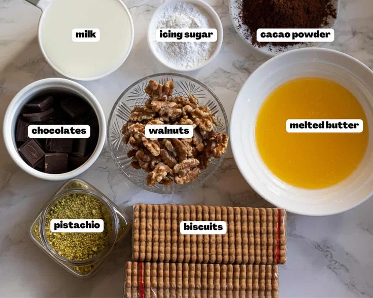 the ingredients for making chocolate are displayed in bowls