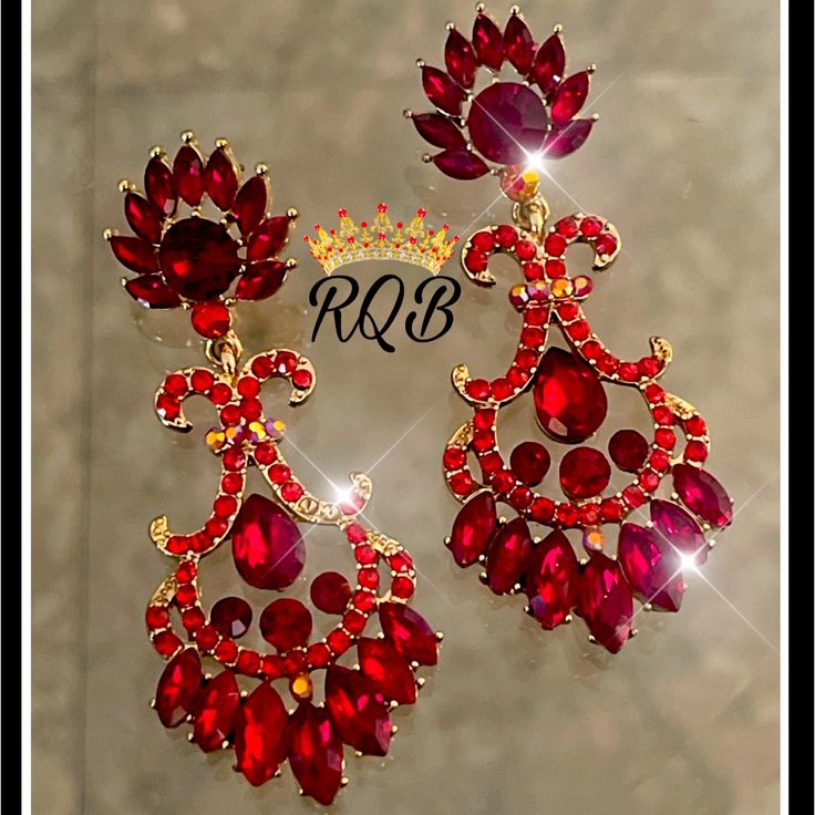 Swarovski Crystals Red 2.50 Inches Red Chandelier Earrings For Formal Events, Formal Red Chandelier Earrings, Red Drop Crystal Earrings For Evening, Red Ruby Dangle Chandelier Earrings, Red Chandelier Earrings For Party, Red Ruby Party Earrings, Red Ruby Earrings For Party, Red Crystal Earrings For Valentine's Day Party, Red Crystal Drop Earrings For Festive Occasions