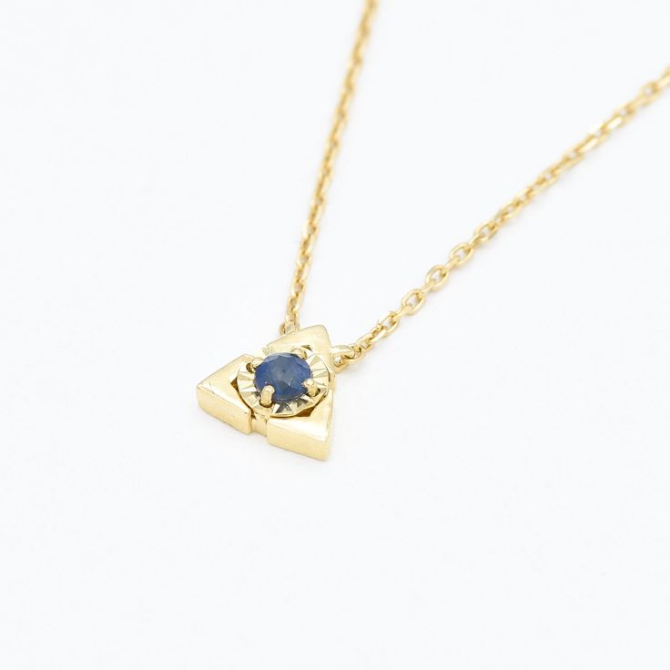 Certified Sapphire Pendant set with Sapphire, size 3 millimetres diameter, 0.11 Carats.Solid 14k Yellow Gold ☞ made to last.Click here for ☞ Solid Gold CollectionSapphire Details:• CERTIFIED Sapphire• Weight: 0.11 Carats• Dimensions: 3mm• Color: Blue• Cut: Diamond• Origin: BurmaSolid Gold Details:• 2 grams of 14k Solid Yellow Gold• Dimensions: Necklace Length 18in to 16in• Lasts a lifetime - Perfect for everyday use (won’t tarnish)*Final weight & dimensions depending on the chosen necklaceSKU HC Gold Triangle, Triangle Necklace, Sapphire Pendant, Gold Collection, Pendant Set, Gold Details, Solid Yellow, Necklace Length, 18k Rose Gold