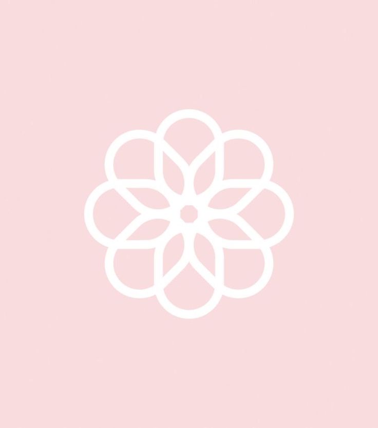 a white flower on a pink background