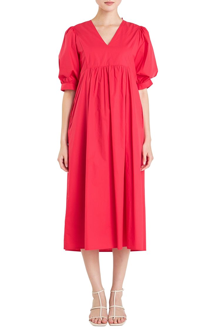 A vibrant hue enhances the summery appeal of this breezy midi dress fashioned with puff sleeves, a flouncy skirt and charming ties at the back. Adjustable back tie closure V-neck Elbow-length sleeves with button cuffs Side-seam pockets Lined 100% cotton Hand wash, dry flat Imported Red Puff Sleeve Dress For Summer Brunch, Red Midi Dress With Smocked Back For Summer, Spring Solid Midi Dress With Gathered Neckline, Billowy Solid Color Midi Dress For Spring, Spring Maxi Puff Sleeve Dress With Pleated Sleeves, Spring Billowy Midi Dress, Midi Dress With Elastic Sleeves For Spring, Solid Midi Dress With Elastic Sleeves For Spring, Red Spring Dress With Gathered Sleeves