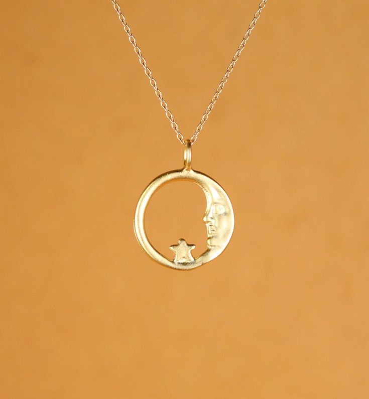 Moon necklace - sun moon and star - moon and star necklace - a gold vermeil moon and star hoop hanging on a 14k gold vermeil chain A peaceful and pretty gold vermeil moon and star charm hanging happily from a 16 inch 14k gold vermeil chain. Please feel free to select a different length chain if you prefer! The moon measures: 16mm across. More from BubuRuby? https://www.etsy.com/shop/BubuRuby?ref=hdr_shop_menu Want to see more gems? http://www.etsy.com/shop/BubuRuby?section_id=12672242 More Druzi Celestial Crescent Jewelry With Star Charm, Sterling Silver Charm Necklace With Moon And Star, Sterling Silver Star And Moon Charm Necklaces, Sterling Silver Star Charm Necklace With Moon Charm, Celestial Half Moon 14k Gold Jewelry, Celestial Crescent 14k Gold Necklace, Celestial Style 14k Gold Half Moon Jewelry, 14k Gold Crescent Celestial Necklace, Celestial Necklace With Star Charm