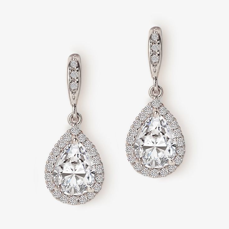 Elegant Teardrop dangle earrings are the perfect gift for your bridesmaids. 18K White Gold plated over base metal Cubic Zirconia pave crystals Hypoallergenic post Height 1.2in(3 cm) x Width 0.5in(1.3 cm) #E267 Teardrop Dangle Earrings, Solitaire Necklaces, Ear Jacket, Wedding Moments, Silver Drop Earrings, Bridesmaid Earrings, Silver Earrings Dangle, Bridesmaids Gifts, Base Metal