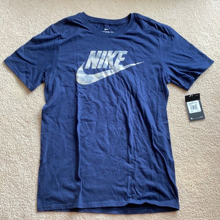 Size S Nike Athletic Shirt Brand New Still Has Tag Price Is Negotiable Casual Navy Sports Shirt, Navy Casual Sports Shirt, Casual Navy Shirt For Sports, Sports Shirt With Blue Logo Print, Casual Blue Sports Shirt, Nike Blue Casual Shirt, Nike Casual Blue Shirt, Casual Blue Nike Shirt, Gray Logo Print Casual Shirt