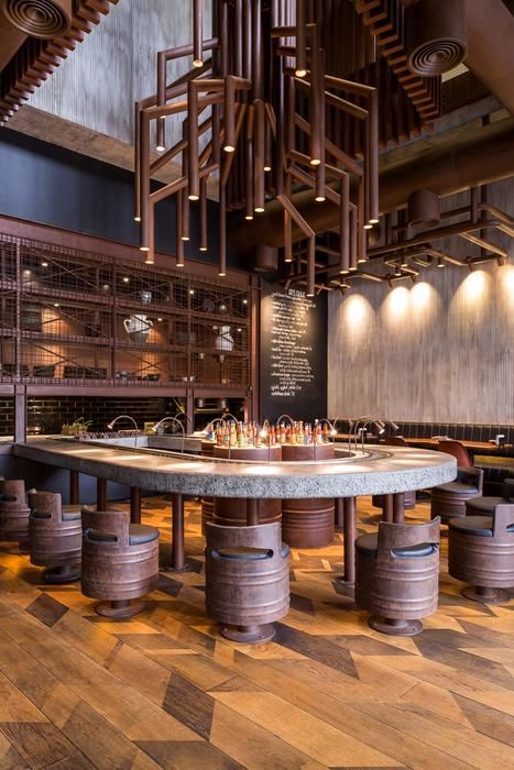 a bar with several stools in front of it