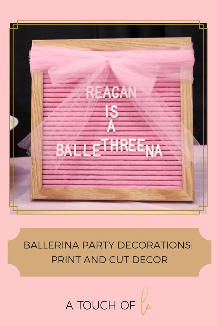 a pink party decoration with the words reagan is a ball - ethrena on it