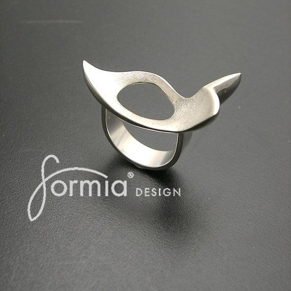 Modern sleek designed ring with simple expression of style. Solid sterling silver,size 7Can be sized to fit your finger!! Contemporary Rings With Unique Design For Formal Occasions, Contemporary Formal Rings With Unique Design, Contemporary Ring With Unique Design For Formal Events, Sleek Silver Rings With Polished Finish, Modern White Gold Jewelry With Unique Design, Contemporary Open Ring With Polished Finish, Modern Jewelry With Unique Design And Open Band, Modern Sterling Silver Rings With Polished Finish, Modern Jewelry With Unique Design And Open Ring