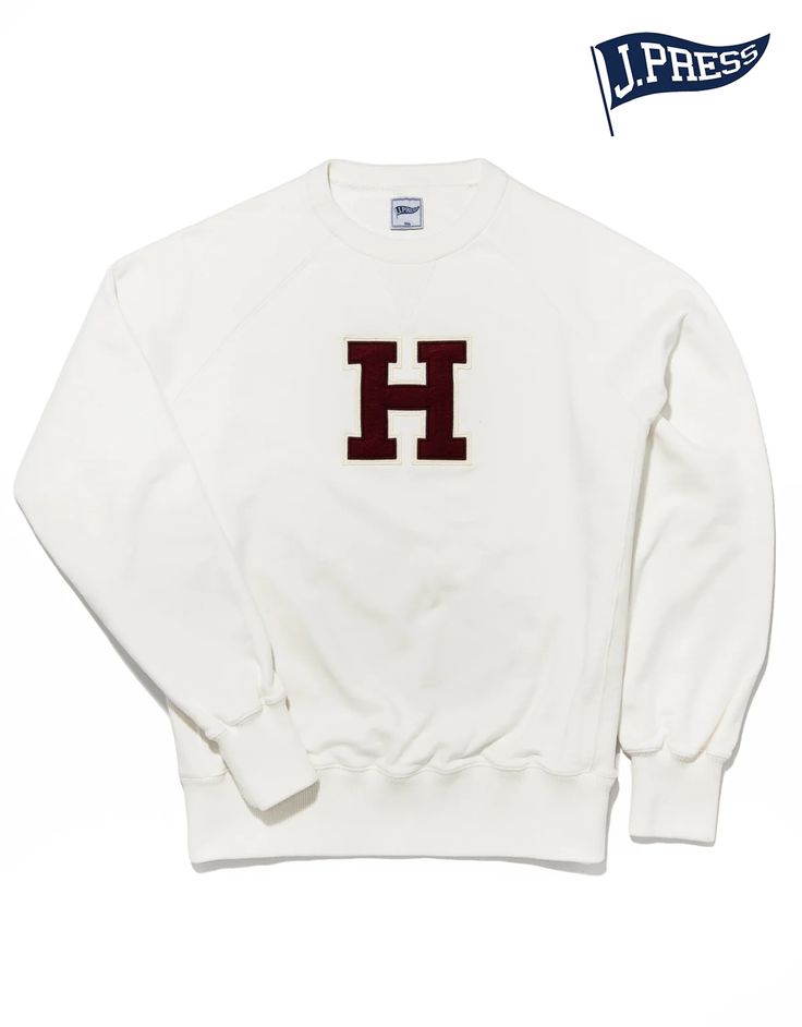 HARVARD "H" SWEATSHIRT - WHITE Oversized White Varsity Sweatshirt, White Oversized Varsity Sweatshirt, White Long Sleeve Sweatshirt For College, White Long Sleeve College Sweatshirt, White Crew Neck Sweatshirt With Embroidered Logo, White Embroidered Logo Crew Neck Sweatshirt, White Collegiate Sweatshirt With Relaxed Fit, Classic White Sweater With Embroidered Logo, White Varsity Sweats For Streetwear