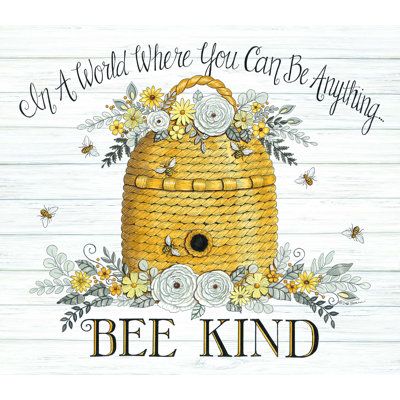 a basket with flowers on it that says bee kind