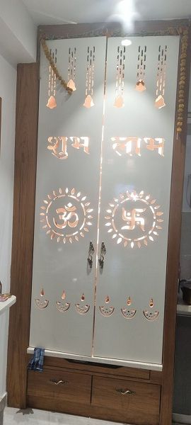 the door is decorated with gold and silver designs on it's glass front doors