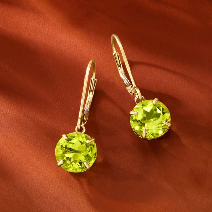 Ross-Simons - 3.90 ct. t. w. Peridot Drop Earrings in 14kt Yellow Gold. Celebrate an August birthday wearing these cool green earrings complemented by sun-kissed 14kt yellow gold. Bright 3.90 ct. t. w. peridots make a luscious statement. Hanging length is 1". Leverback, peridot drop earrings. Peridot birthstones are the perfect gift for August birthdays. Peridot Gold Earrings, Classic Peridot Jewelry With Prong Setting, Classic Green Diamond Cut Earrings, Formal Green Diamond Cut Earrings, Classic Green Round Earrings, Elegant Lime Green Earrings For Formal Occasions, Elegant Lime Green Earrings For Formal Events, Classic Green Peridot Earrings, Classic Peridot Jewelry