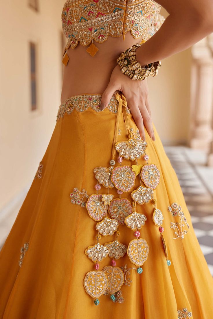 Orange peel embroidered lehenga set – INDIASPOPUP.COM 2024 Indian Fashion, Fancy Latkans For Lehenga, Lehenga Latkan Designs, Zardozi Embroidery Designs, Zardozi Lehenga, Lehenga Latkan, New Lehenga Designs, Gorgeous Lehengas, Tassels Fashion Clothing