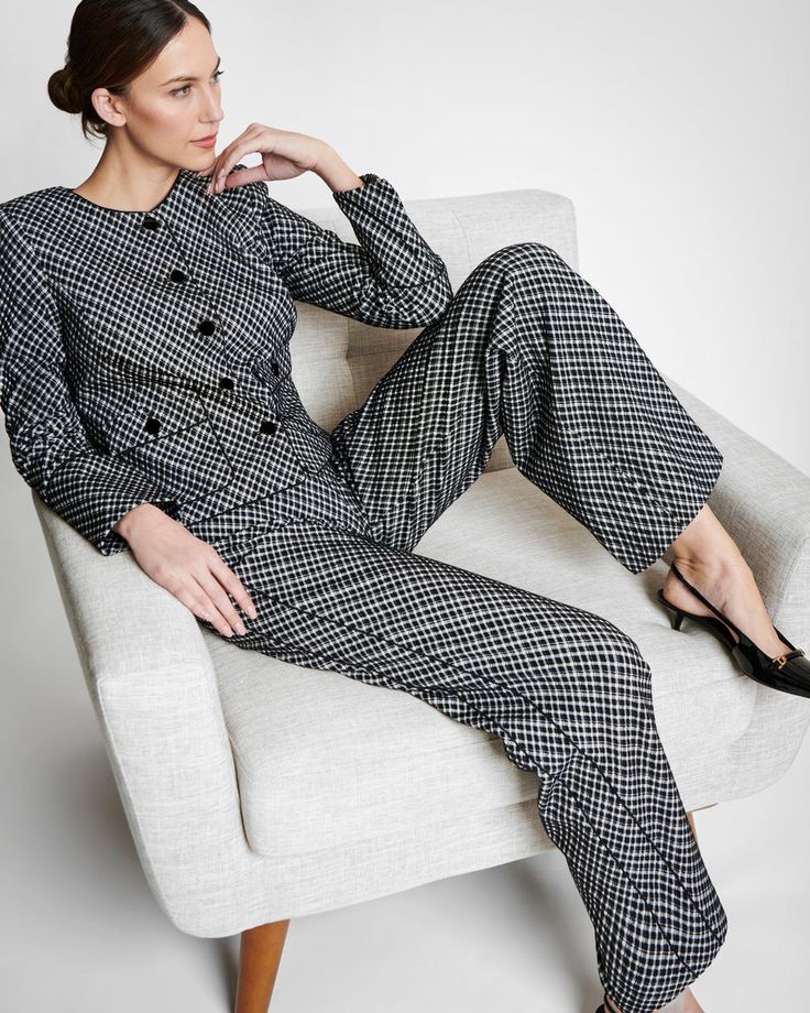 A sophisticated style that transcends trends, this ponte jacket comes in a ladylike silhouette in perfectly plaid jacquard that's woven directly into the fabric. With gold-finished buttons, piping details, and elongated cuffs, this jacket pairs back to our Ponte Wide Leg Pants in Jacquard for an easy, office-to-nightcap set. | Spanx Women's Ponte Lady Jacket in Jacquard Elegant Double-breasted Houndstooth Tweed Jacket, Elegant Plaid Blazer With Buttons, Elegant Plaid Tweed Jacket With Button Closure, Women's Work Clothes, Lady Jacket, Corporate Attire, Layered Tops, Black Plaid, Sophisticated Style