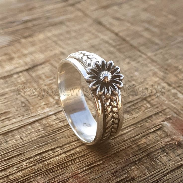 Adjustable Flower Rings For Anniversary, Adjustable Flower Shaped Anniversary Rings, Adjustable Stackable Flower Ring, Adjustable Flower Engraved Promise Ring, Flower Shaped Engraved Adjustable Promise Ring, Nature-inspired Adjustable Flower Ring For Anniversary, Flower Shaped Stackable Promise Rings, Bohemian Flower Ring For Promise, Stackable Flower Promise Rings