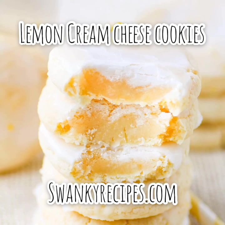 lemon cream cheese cookies stacked on top of each other