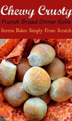 a bunch of bread rolls sitting on top of a cloth covered bowl with the words chey crusty french bread dinner rolls