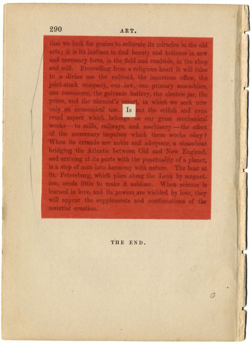 an old book with red paper on it