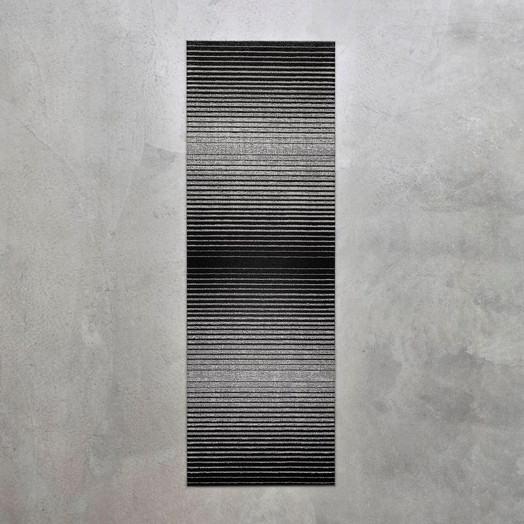 an abstract black and white photo with vertical lines