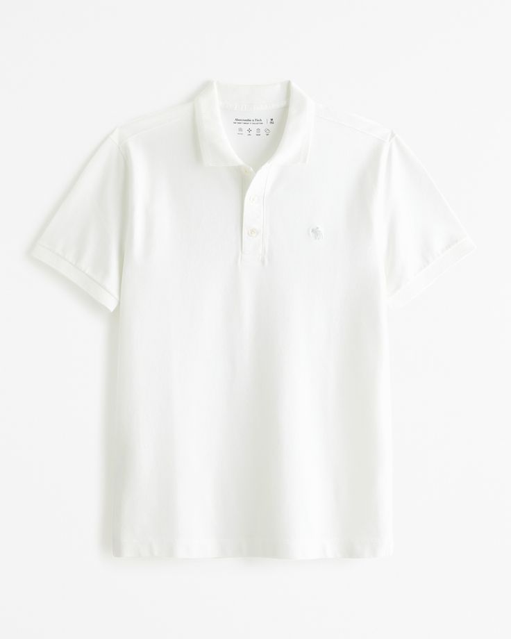 Our classic cotton-blend pique polo with 4-way stretch and moisture-wicking properties to keep you cool throughout the day. Featuring a two-button placket, classic collar, straight hem and small-scale embroidered icon detail. Classic Relaxed Fit Polo Shirt For Golf, Classic Cotton Polo Shirt For Golf, Everyday Fitted Cotton Polo Shirt, Basic Fitted Cotton Polo Shirt, Classic Polo Shirt For Golf, Classic White Polo Shirt For Everyday, Basic Cotton Polo Shirt, Basic Solid Polo Shirt With Relaxed Fit, Sporty Cotton Polo Shirt For Summer