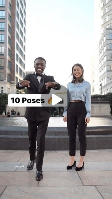 two people in suits and ties are standing on the sidewalk with one person holding a sign that says 10 poses