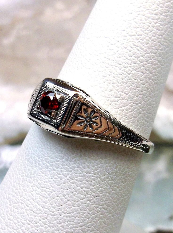 Natural Garnet Ring  Deco Wedding Design#155 Made To Order Here we have an Art Deco/Edwardian reproduction ring in sterling silver filigree with a red garnet gemstone solitaire. This full cut round cut natural garnet is 3mm in diameter. The setting is 7mm NS on the finger. The inside of the band is marked 925 for sterling. Notice the beautiful sun & swirl etched design of the silver filigree setting. This is a lovely rendition of a 1920's Antique filigree ring, and it is ready to wear. A gift ri Wedding Rings Unique Vintage, Garnet Wedding Rings, Filigree Wedding Ring, Garnet Wedding, Mothersday Gift, Wedding Red, Gemstone Art, Order Design, Garnet Gem