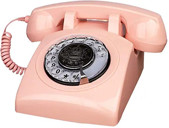 an old - fashioned pink phone is shown on a white background