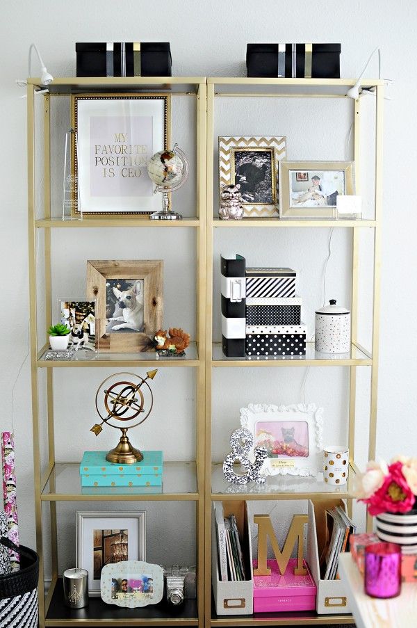 a book shelf filled with lots of different types of items on top of each other