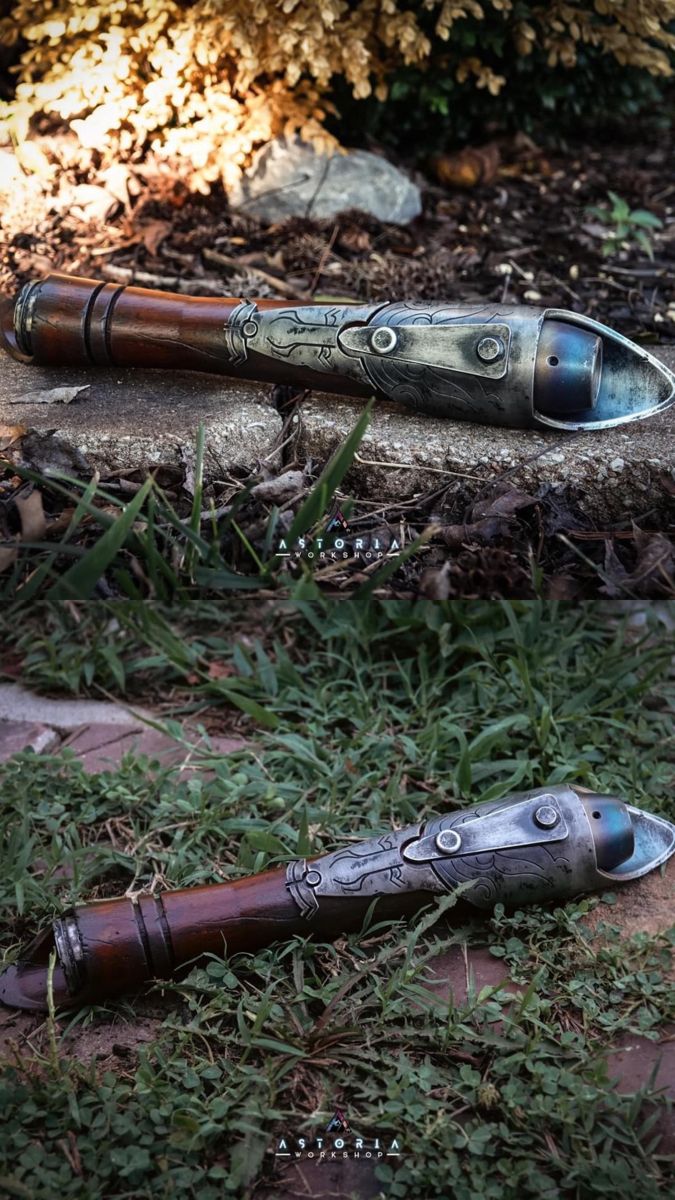 two different types of pens sitting on the ground next to each other in grass and rocks