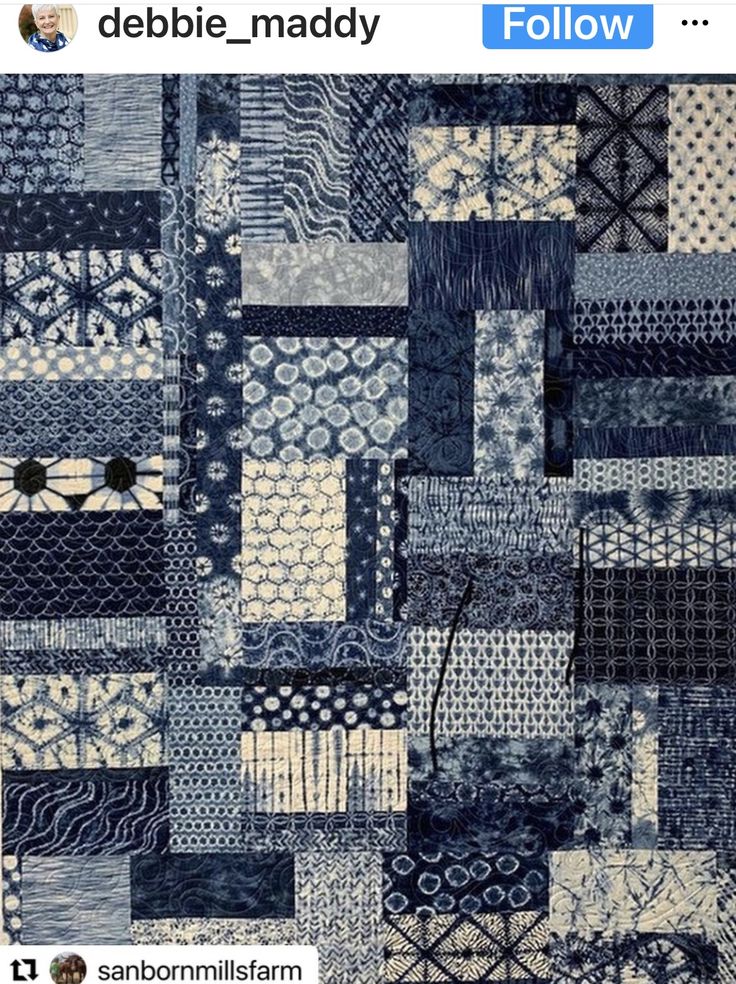 a blue and white patchwork quilt