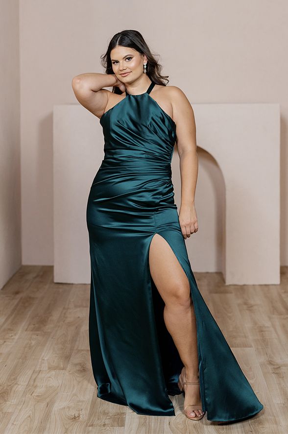 Enhance your bridal party with this modern and fitted version of a halter dress that will keep everyone looking! Our Fallon Satin dress features a halter neck that ties in the back with thick satin straps leaving your back open and is then finished with a delicate gathering at the waist on the left side of this dress to provide extra tummy coverage. Fallon pairs well with our Rory, Jade, and Dawson dresses. FEATURES: Fitted silhouette Halter top neckline Built-in bra cups and vertical boning for Wedding Parties Colors, Top Neckline, Bridesmaid Dress Colors, Halterneck Dress, Fitted Silhouette, Satin Dress, Color Swatches, Bra Cups, Your Back