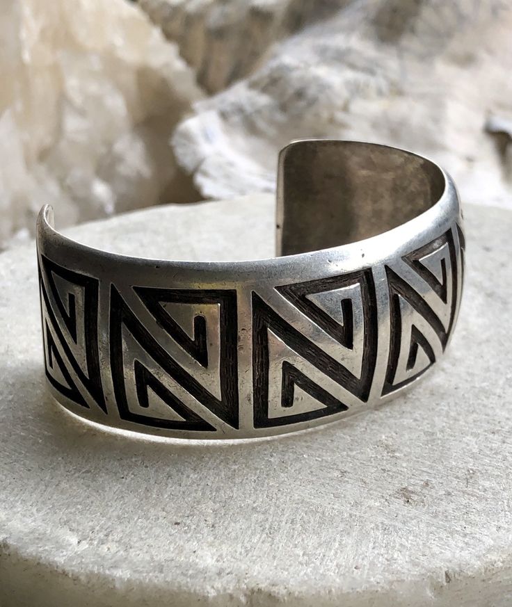 Sterling Silver Tribal Cuff Native American Vintage Bracelet Measures 1 inch wide, see pics for additional ,measurements weighs 42 grams The bracelet measures aprx 5 1/2 inches around not including the gap. Southwestern Style Bangle Cuff Bracelet For Festivals, Handmade Vintage Wide Band Cuff Bracelet, Unique Adjustable Wide Band Cuff Bracelet, Adjustable Wide Band Engraved Cuff Bracelet, Adjustable Engraved Wide Band Cuff Bracelet, Adjustable Wide Band Cuff Bracelet, Handmade Vintage Wide Band Bracelet, Bohemian Wide Band Adjustable Cuff Bracelet, Adjustable Wide Band Vintage Bracelet