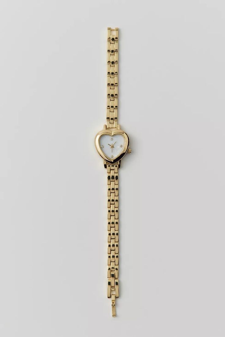 Heart Linked Watch | Urban Outfitters Heart Watch Gold, Dainty Watches Women, Fashion Watches For Women, Larson And Jennings Watch, Gold Jewelry Combo, Apple Watch Chain Band, Amazon Watches Women, Gold Heart Watch, Plus Size Jewelry