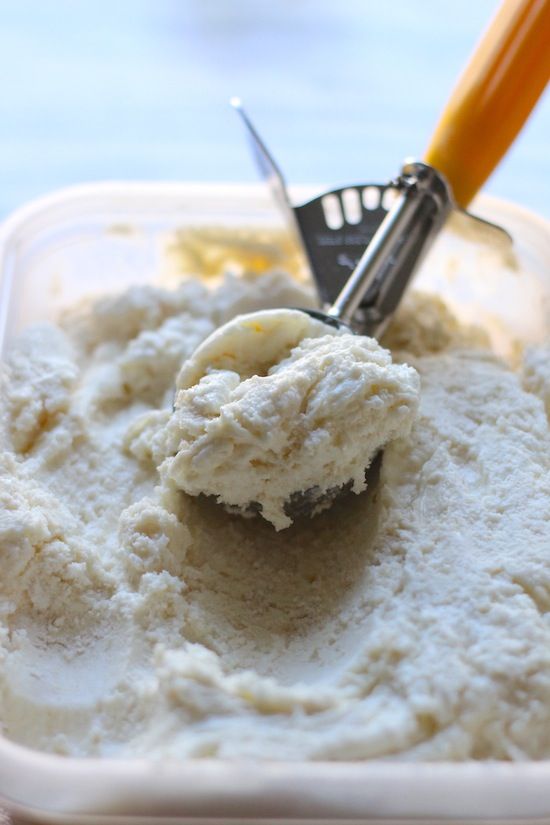 a scoop of ice cream in a plastic container