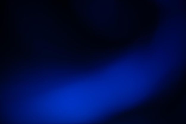 a blurry blue background is shown in this image, it appears to be very dark