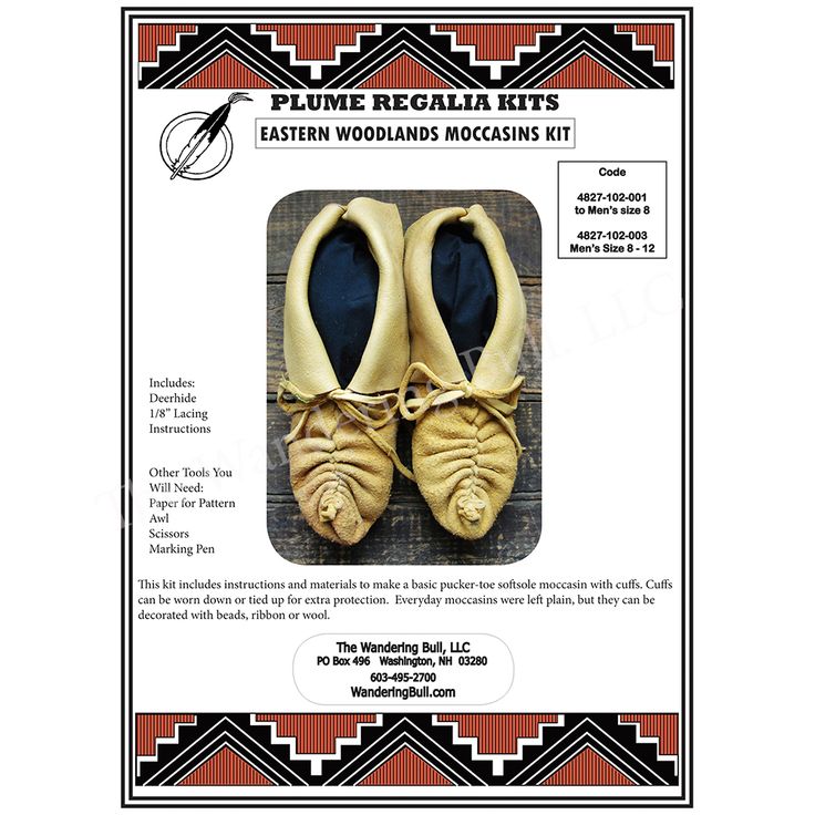 a pair of brown ballet shoes sitting on top of a wooden floor in front of a black and white frame