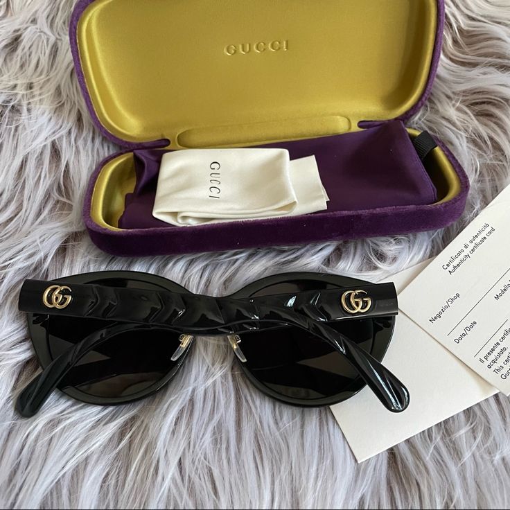 New Authentic Gucci Black Slight Cat Eye Sunglasses With Textured Arms And Gold Gg Emblems Tried On Only But Never Worn. No Scratches Or Any Flaws Will Ship With Everything Shown In The Photo Including Case And Authenticity Card Sells Used On Fashionphile For $350 Designer Black Cat Eye Sunglasses For Party, Designer Gucci Cat Eye Sunglasses, Designer Cat Eye Sunglasses With Mirrored Lenses, Designer Cat Eye Sunglasses With Uv Protection For Party, Elegant Black Gucci Cat Eye Sunglasses, Gucci Elegant Cat Eye Sunglasses With Uv Protection, Gucci Luxury Cat Eye Sunglasses For Evening, Elegant Gucci Cat Eye Sunglasses With Uv Protection, Elegant Gucci Cat Eye Sunglasses For Evening