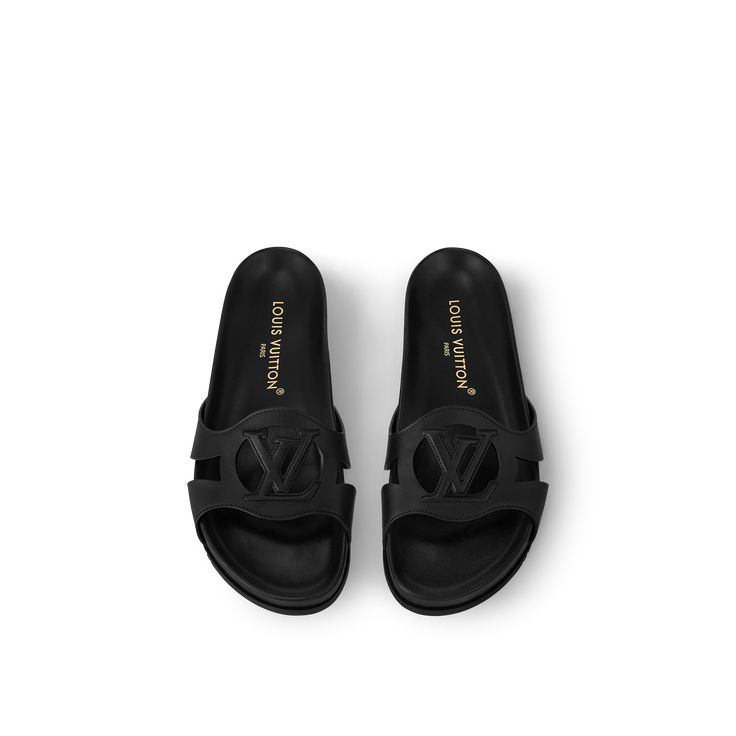 LOUIS VUITTON® - Lv Isola Flat Comfort Mule - Black Lv Slippers, Luxury Sandals, Louis Vuitton Gifts, Spring Sandals, Trunk Bag, Louis Vuitton Official, Buckle Shoes, Wallet Pouch, Silver Jewelry Fashion