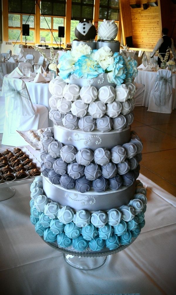 a wedding cake made out of cupcakes and diapers