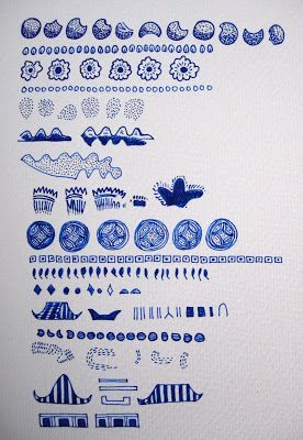 an image of blue and white designs on paper