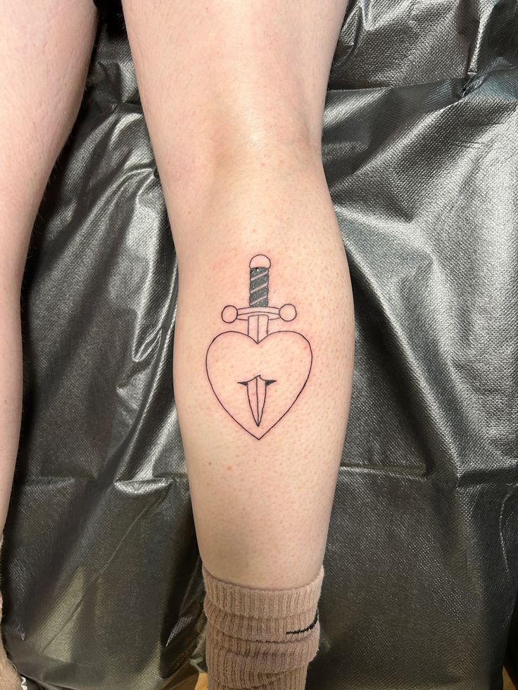 Calf tattoo, heart, dagger, fine line Heart Dagger Tattoo, Dagger Tattoo, Calf Tattoo, Tatting, Tattoos, Pins