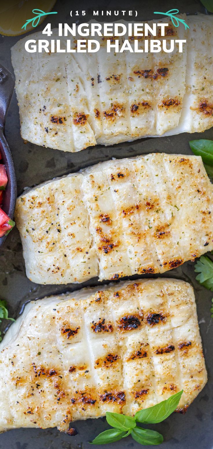 grilled halibut on a platter with tomatoes and herbs in the background