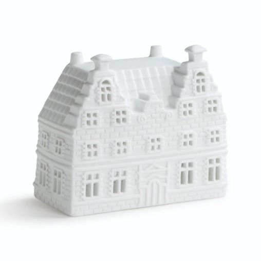 a white ceramic house shaped like a building