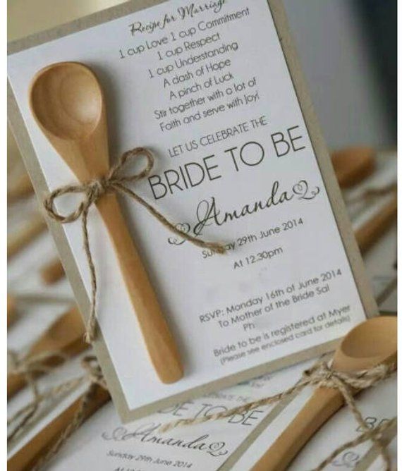 a wooden spoon on top of a card