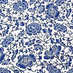 blue and white floral wallpaper with large flowers on the left side, in an ornate pattern