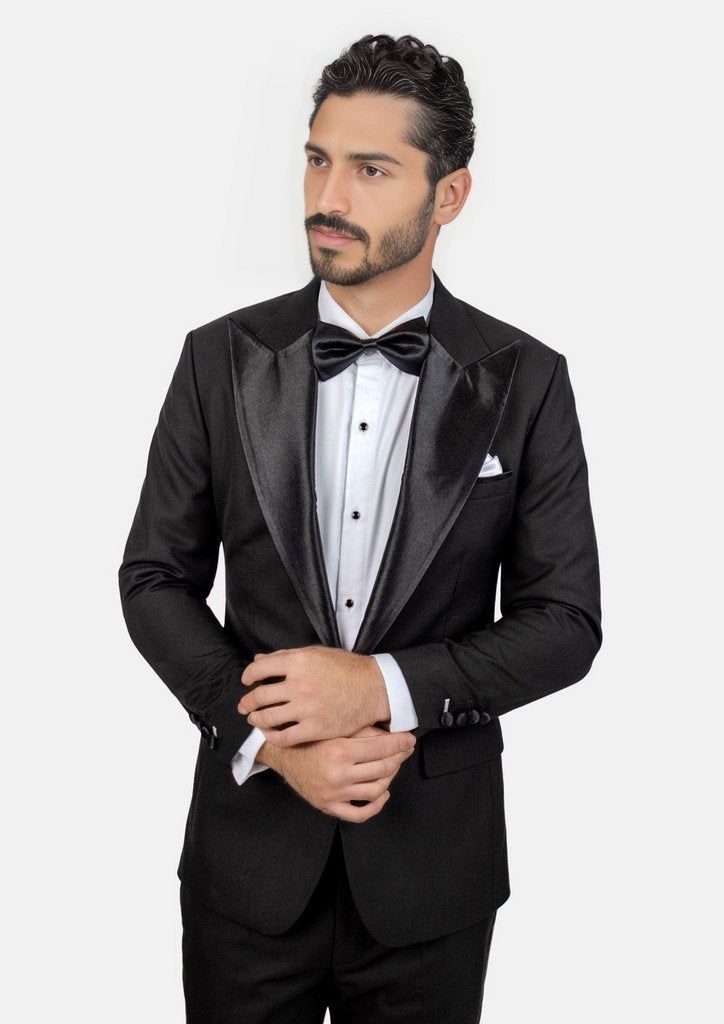 Crafted from a luxurious sharkskin weave wool, the Liberty Black Tuxedo is a sophisticated, statement-making formalwear option. Wide peak lapels in a single button configuration stand out from typical tuxedo styles. Dress to impress with this high-end, premium garment – a modern blend of elegance and refinement. Tuxedo Styles, Suit Guide, Styles Dress, Custom Made Suits, Blue Tuxedos, White Tuxedo, Black Bow Tie, Vest And Tie, Body Posture